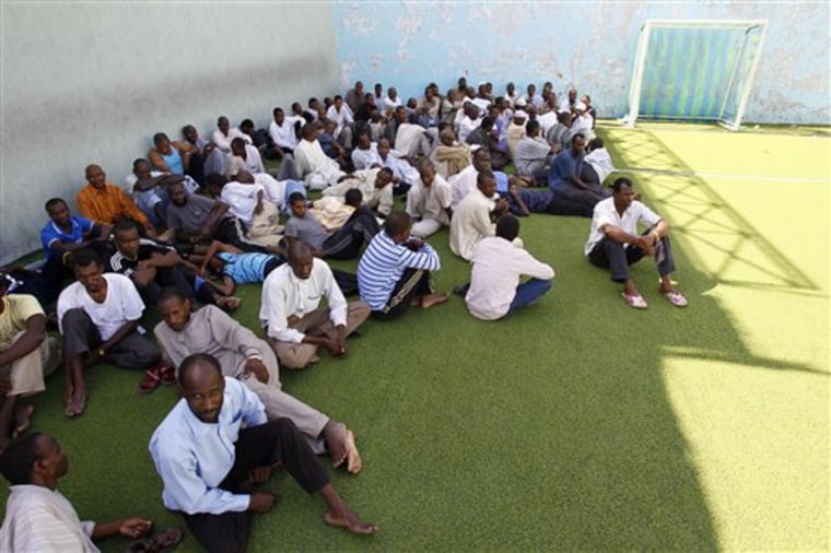 Men suspected of being mercenaries for Moammar Gadhafi are held in a district sports center next to the medina, set up as provisory jail in Tripoli, Libya.